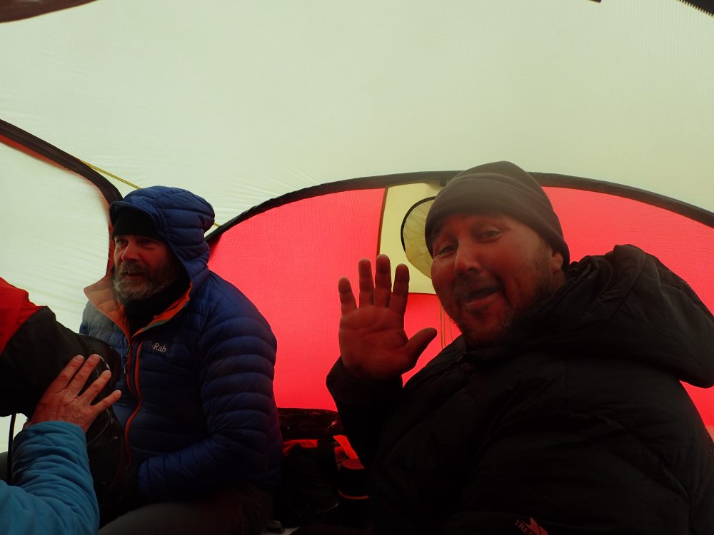 Bengt and Salo (waving) in tent