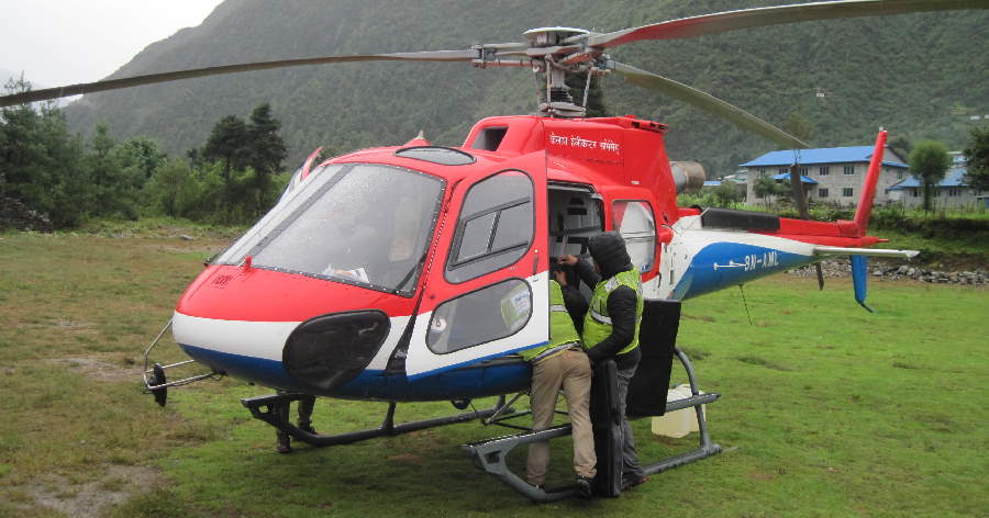 Unloading our copter at Lukla